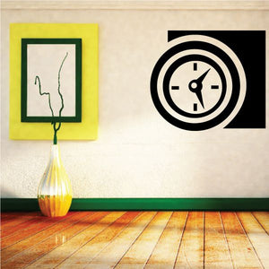Black clock face wall decal with circular hands and arrows