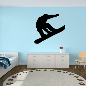 Ollie snowboarding decal with black snowboarder silhouette
