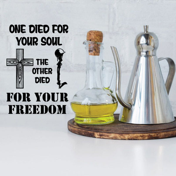 Vinyl decal with bold black text, cross icon, and silhouette figures, on light background