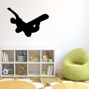 Black snowboarding rider silhouette wall decal with snowboard trick pose