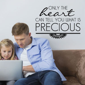 Typography wall decal with stylized heart and quote, black text and sunburst accents