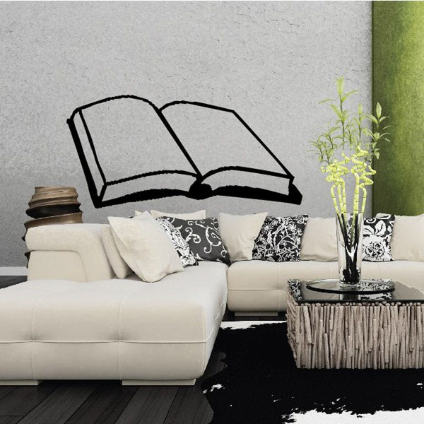 Open Bible wall decal, black open-book outline above sofa