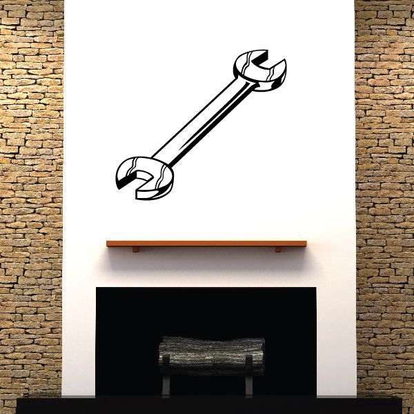 Open-ended wrench wall decal, black line-art with two open ends