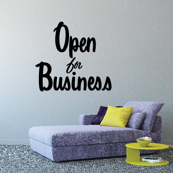 Wall decal text reading "Open for Business" in black script lettering