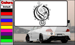 Car decal sticker with black ornate music-note crest and scrollwork