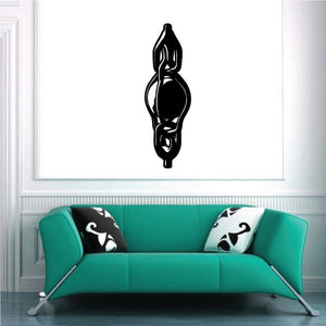 Black orb wall decal with swirling circular motif, vertical sticker