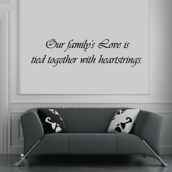 Script wall decal: “Our family's Love is tied together with heartstrings.”