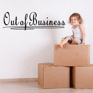 Out of Business wall decal with black cursive text and underline