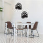 Outlined bear track wall decal with two black paw prints