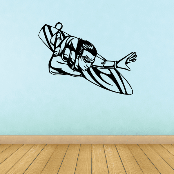 Black surfer on surfboard wall decal with bold outlined artwork