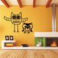 Two cartoon owl wall decals with wide eyes and wings spread.