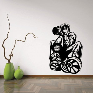Paintball wall decal: black paintball player with gun on wheels