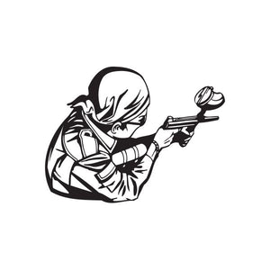 Black and white paintball player vinyl wall decal aiming a paintball gun