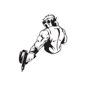 Vinyl paintball wall decal of a black-and-white player holding a paint marker