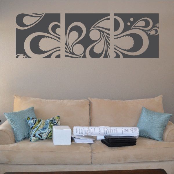Gray paisley vinyl wall decal with symmetrical curls and teardrop motifs