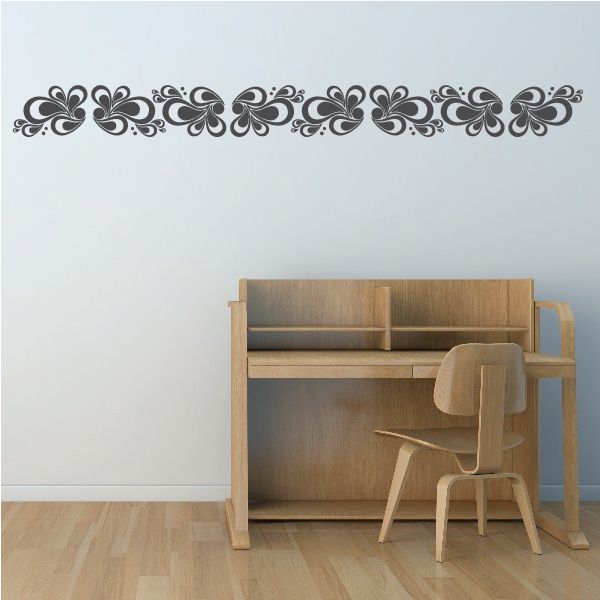 Paisley wall decal border with dark scroll flowers in a horizontal row