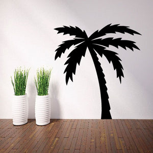 Palm tree leaning decal, black palm tree silhouette on light wall.