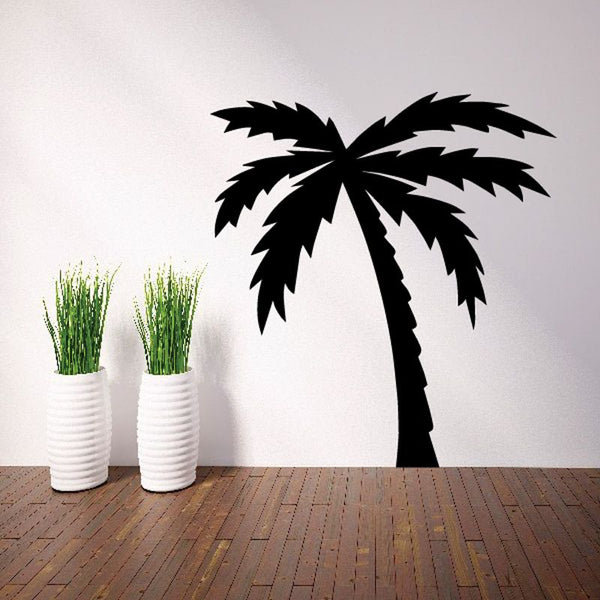 Palm tree leaning decal, black palm tree silhouette on light wall.