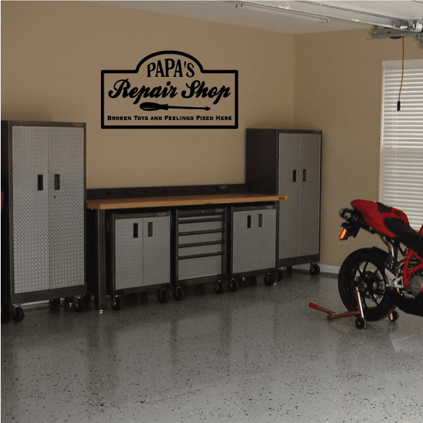 Papas repair shop decal, black and white badge with Repair Shop lettering