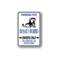 Basset hound parking sign wall decal with blue text, dog illustration, and owners-only arrows