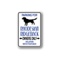 Vinyl parking sign decal with Rhodesian ridgeback silhouette and blue text: owners only