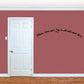 Wall sticker with cursive message “Peace, Love and Joy to all who enter here”