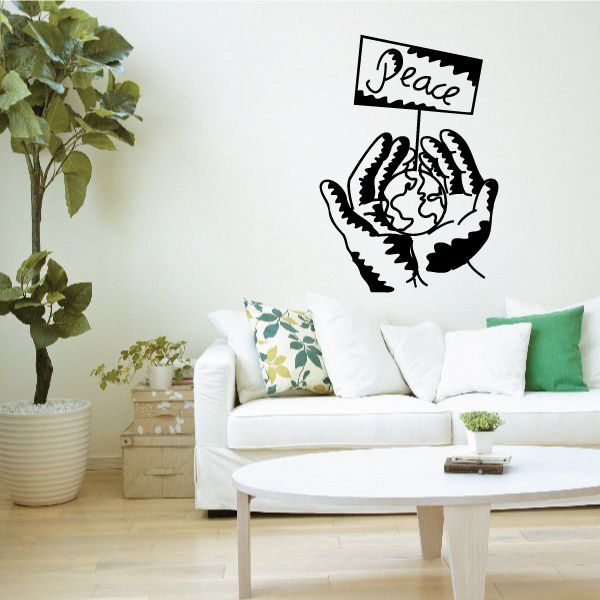 Peace decal with black hands holding a globe and banner reading “Peace”