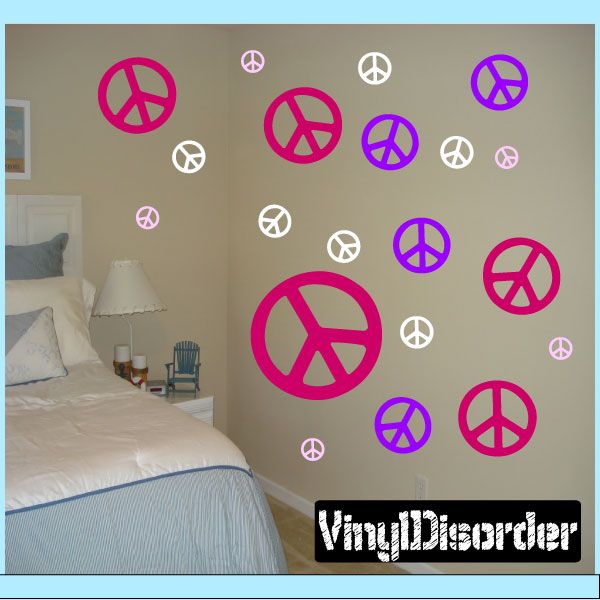 Peace sign wall decal kit with pink, purple, and white peace symbols