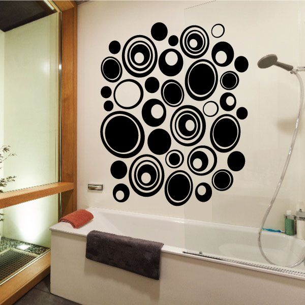 Pebbles wall decals kit with mixed-size circular decals in black and white