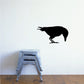 Black crow pecking silhouette wall decal