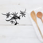 Black pheasant bird on branch wall decal with decorative star flowers