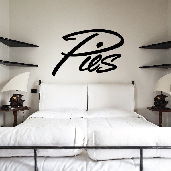 Vinyl wall decal with bold black cursive “Pies” lettering and swoosh