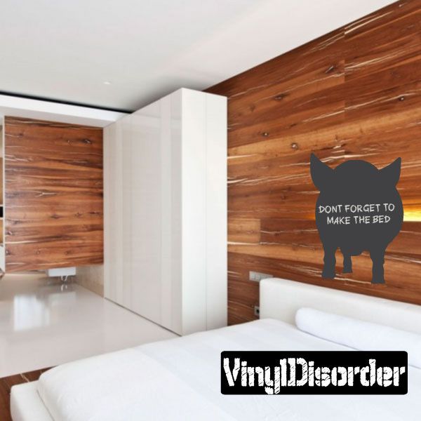 Chalkboard pig decal with white quote and black silhouette on wall