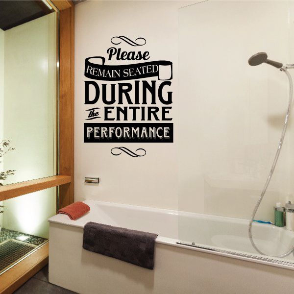 Bathroom wall decal: "Please remain seated during the entire performance" text