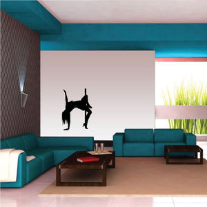 Pole dancer silhouette wall decal in black, forming an H shape