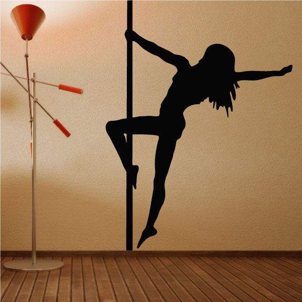 Wall decal of a black pole dancer silhouette reaching out around a pole