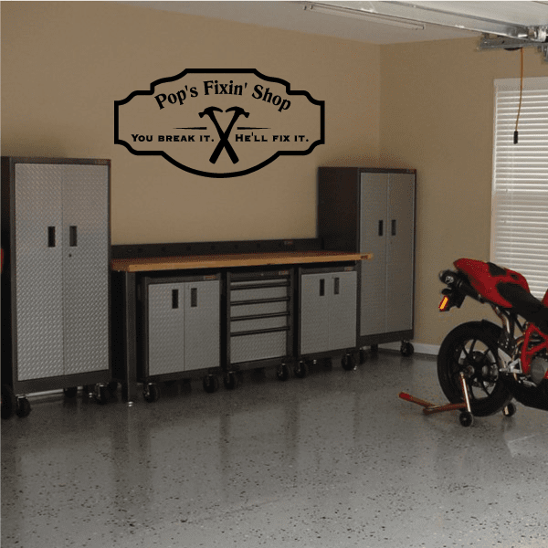 Vinyl wall decal featuring 'Pops Fixin' Shop' logo with crossed tools and banner