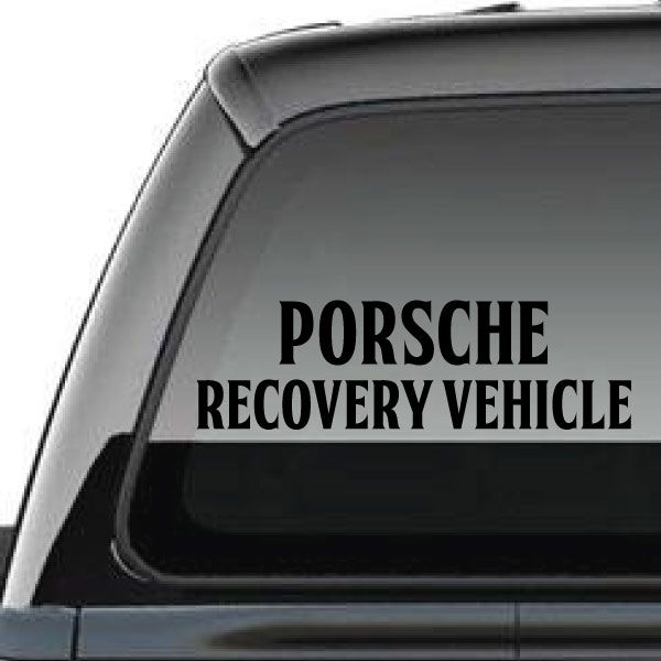 Porsche recovery vehicle decal with black text on a car window