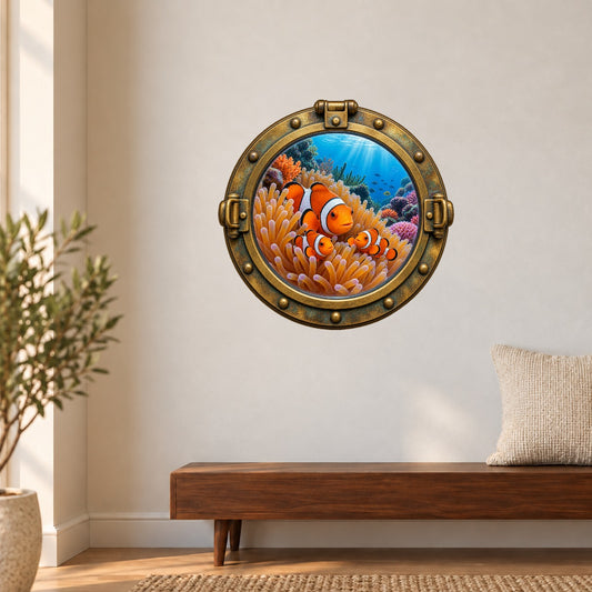 Round porthole wall sticker with a brass-look frame and clownfish among coral