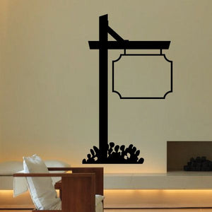 Vinyl wall decal of a signpost with blank rectangular sign and decorative base