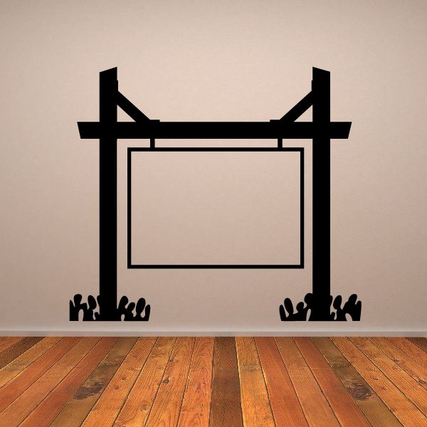 Black vinyl wall decal of rectangular frame with two posts and flanking leaf silhouettes.
