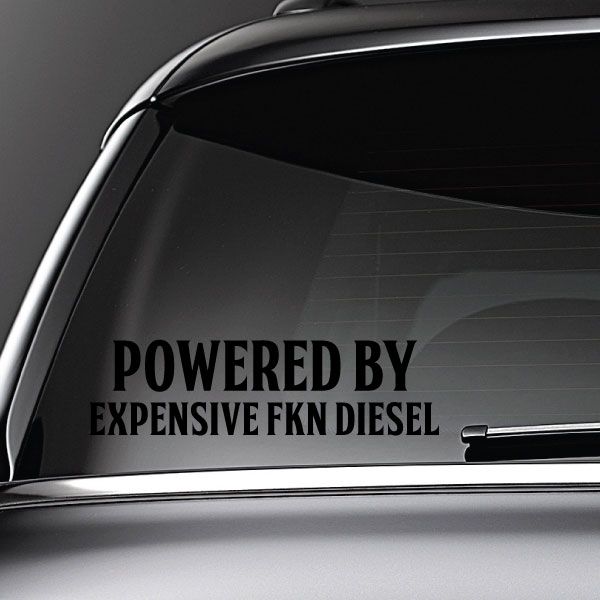 Car window decal reading 'POWERED BY EXPENSIVE FKN DIESEL' on dark glass