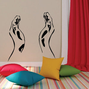 Praying hands open decal with two black outlined hands on a wall