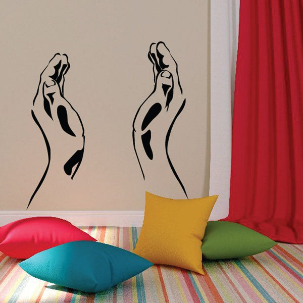 Praying hands open decal with two black outlined hands on a wall