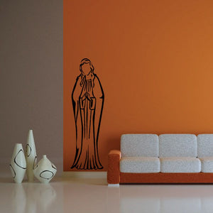 Praying nun decal with black outline of a kneeling nun in prayer