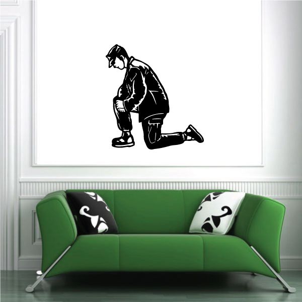 Praying Soldier wall decal: black kneeling soldier praying with hands clasped.
