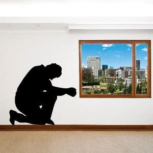 Praying to the Lord wall decal, black kneeling silhouette with hands clasped