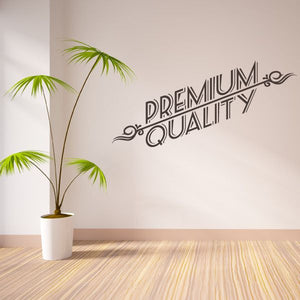 Vinyl wall decal reading “PREMIUM QUALITY” with palm leaf graphics