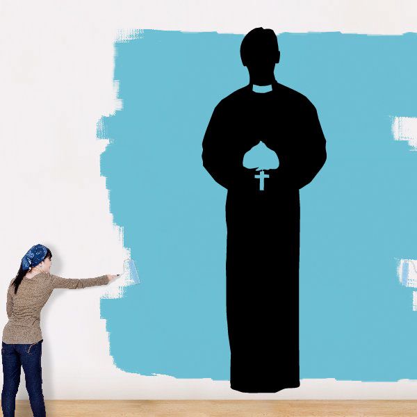 Priest holding rosary decal, black silhouette figure with cross pendant
