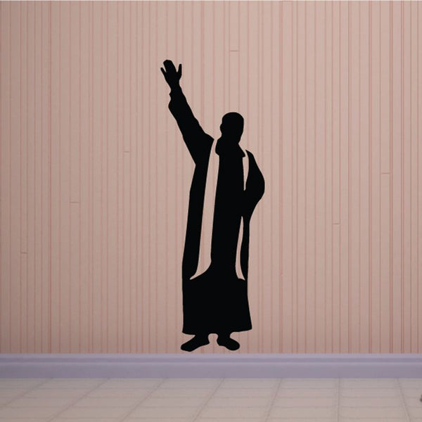 Black praying priest wall decal with raised arm silhouette
